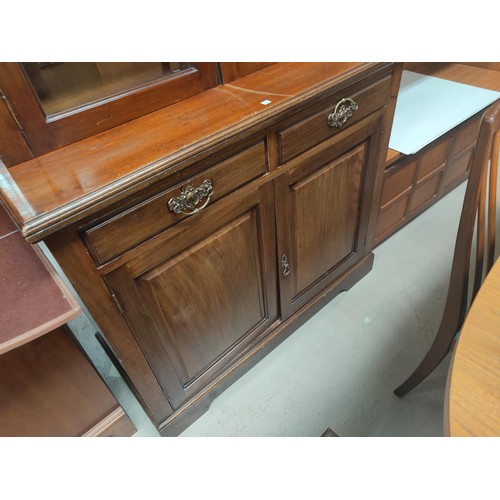 844 - An Edwardian walnut full height bookcase with 2 glazed doors over 2 cupboards and 2 drawers