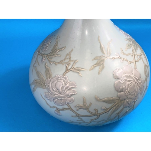 410 - A Lladro large bulbous vase in the Chinese style with slender neck, decorated with flowering branche... 