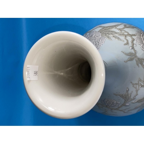 410 - A Lladro large bulbous vase in the Chinese style with slender neck, decorated with flowering branche... 