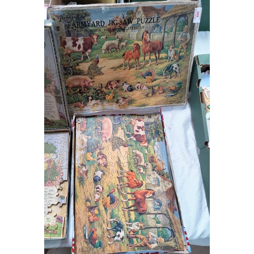 299 - 2 vintage wooden jigsaws, originally boxed and complete (boxes a.f.)