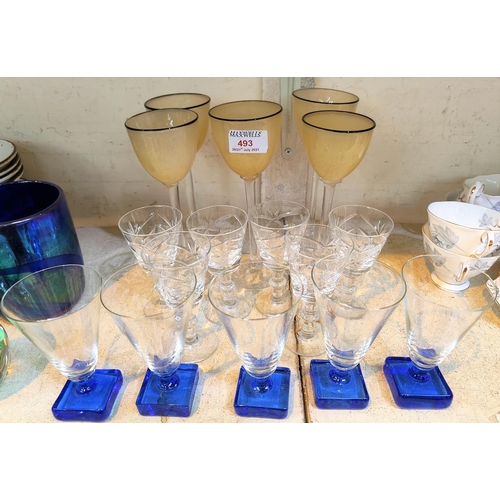 482 - A set of six Manchester opaque tall stem hock glasses, four blue square base glasses other drinking ... 