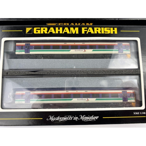 335 - A Graham Farish N gauge originally boxed Class 91 91004 'Grantham' with DVT Trailer 371-801; a Graha... 