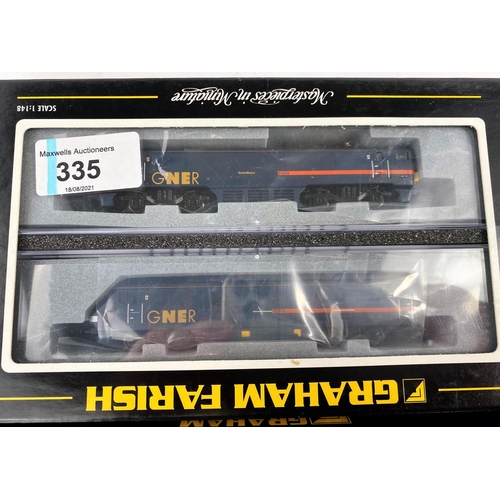 335 - A Graham Farish N gauge originally boxed Class 91 91004 'Grantham' with DVT Trailer 371-801; a Graha... 