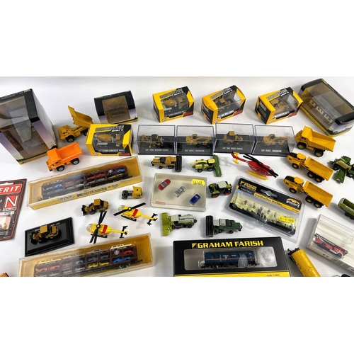 336D - A large selection of N gauge and similar diecast and other vehicles including Caterpillar, Graham Fa... 