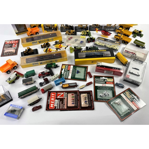 336D - A large selection of N gauge and similar diecast and other vehicles including Caterpillar, Graham Fa... 