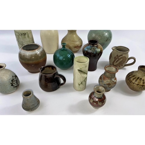 351 - A large selection of small stoneware Studio pottery vases, several with maker's monograms