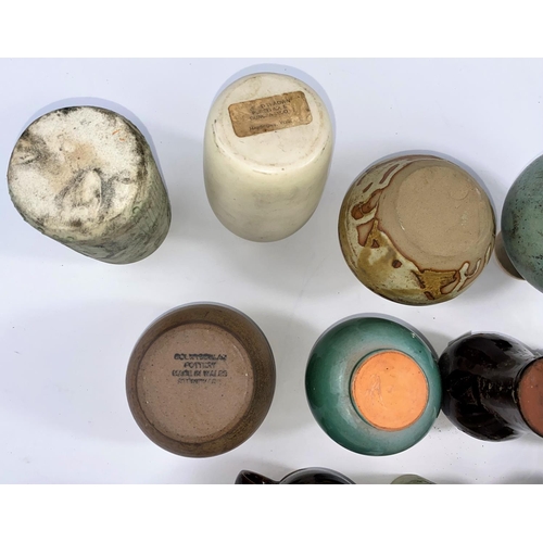 351 - A large selection of small stoneware Studio pottery vases, several with maker's monograms