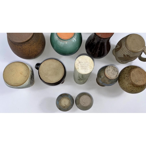 351 - A large selection of small stoneware Studio pottery vases, several with maker's monograms