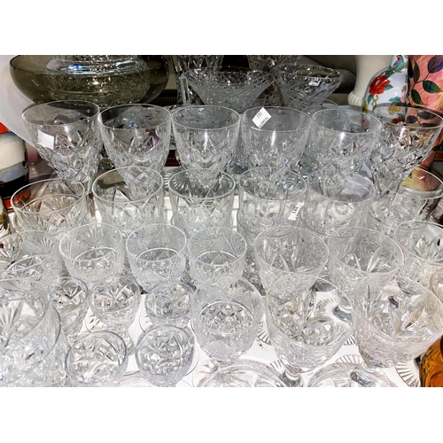 391 - A large selection of cut glassware and drinking glasses including Royal Brierley