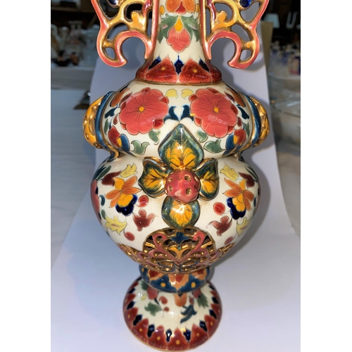 417 - A late 19th century continental vase in the Zsolnay Pecs manner with overall floral decoration and r... 