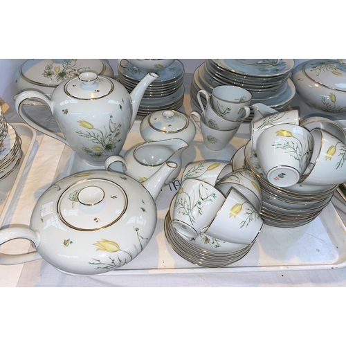 419 - A German KPM hand painted part dinner and tea service with gilt border and central flowers approx 70... 