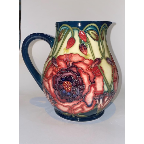 427 - A modern Moorcroft baluster jug decorated with roses, trial piece dated 4.6.04, height 15 cm