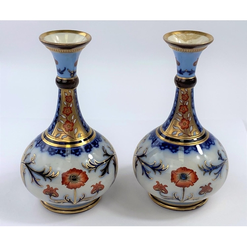 449 - A Macintyre pair of Art Nouveau vases, bulbous form with slender necks (1 rim glued); a similar blue... 