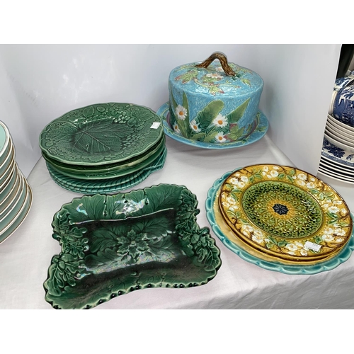 404 - A Minton style Majolica Stilton dish (restored) and a 19th century and later green glaze leaf plates