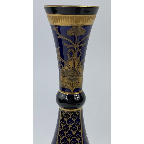 449 - A Macintyre pair of Art Nouveau vases, bulbous form with slender necks (1 rim glued); a similar blue... 