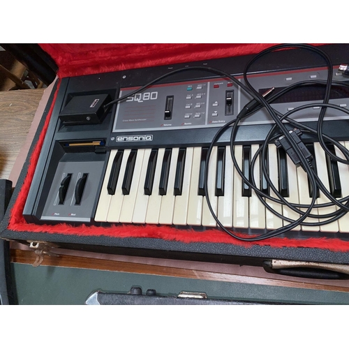 158 - A vintage Peavey Ensonic SQ 80 Crass Wave electric keyboard/Synthesiser in hard carry case