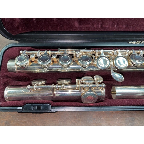 161 - A hard cased Yamaha Nicol plated flute No 211