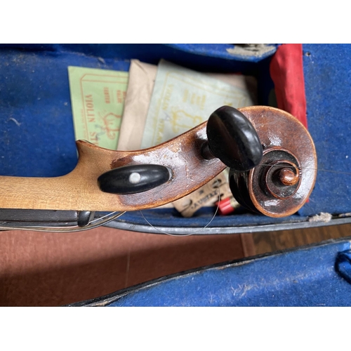 162 - A late 19th/early 20th century violin with 2 piece back, stamped to rear Vuillaume a Paris, in hard ... 