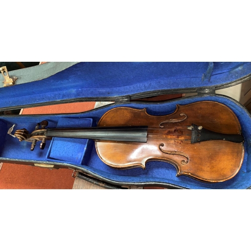 170a - Violin.  A 19th century 3/4 violin with two piece back, bearing a label to the interior: Antonius St... 