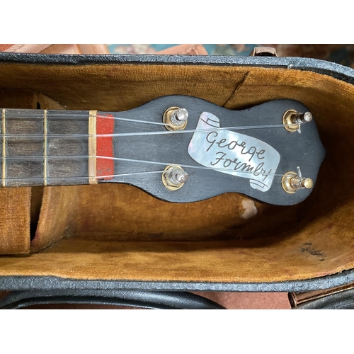 171 - A Pre WWII Banjolele Dallas model E George Formby No 1031with mother of pearl inlay to fret and a mo... 