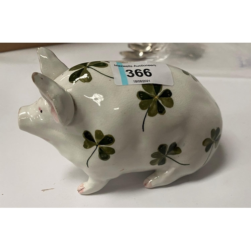 366 - A Wemyss piggy bank, decorated in the clover pattern, marked 'WEMYSS' to base, 9.5cm high, 16cm long