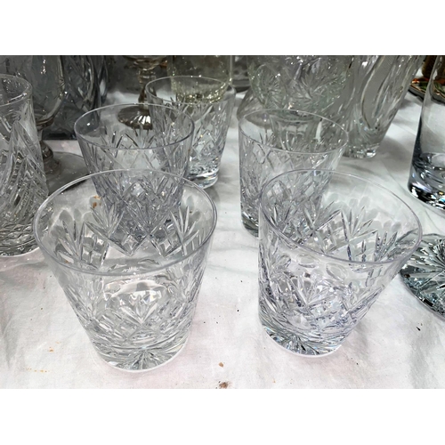 445 - A selection of decanters and other cut glassware