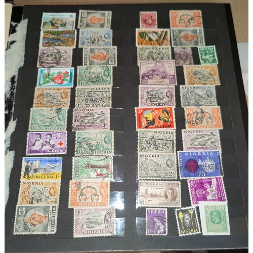 139B - An album of Nigerian and Zimbabwe stamps