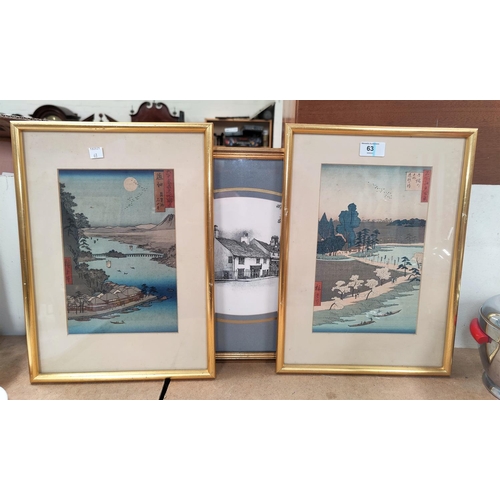 63 - A pair of early/mid 20th century Japanese coloured prints, river landscapes with character text, 28 ... 