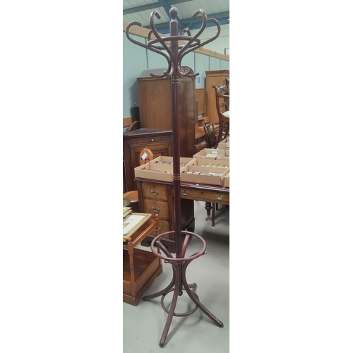 664 - A Bentwood hat and coat stand, a brass top occasional table