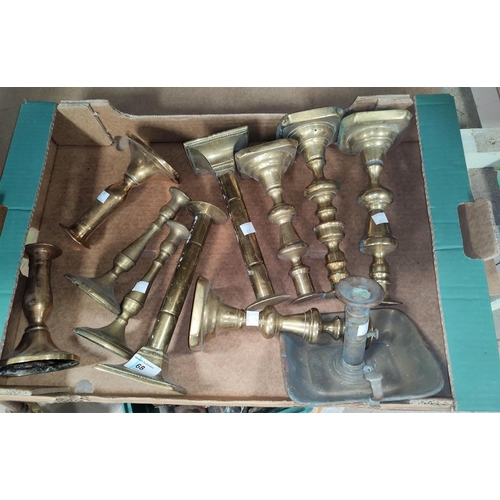 68 - A selection of 18th century brass candlesticks