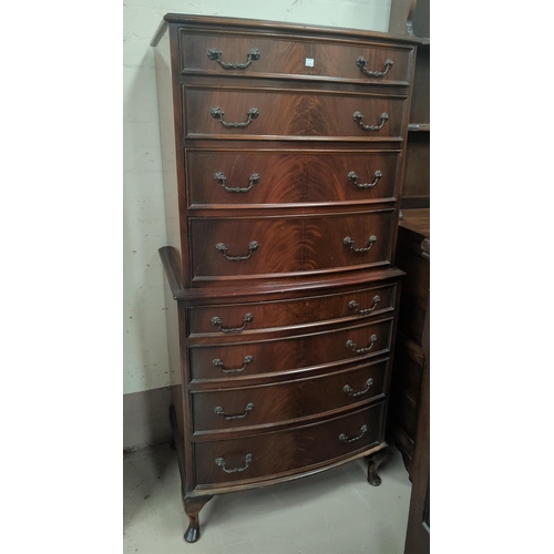 680A - A reproduction mahogany 8 drawer chest on chest on cabriole legs