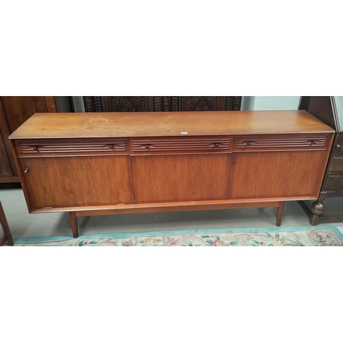 702 - A 1960's teak lowline sideboard by Dalescraft