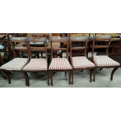 714 - A Regency set of 5 mahogany dining chairs with sabre legs, regency stripe seats