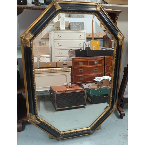 756 - A black and gilt wall mirror