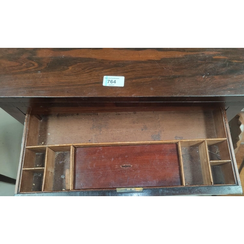 764 - A 19th century rose wood fold out writing table with fitted drawer beneath, U shaped support with ca... 