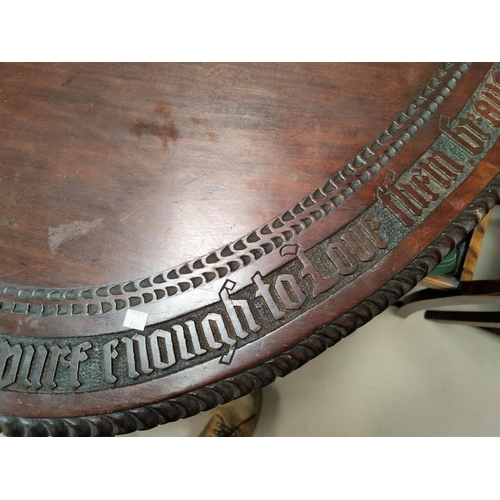 781 - An early to mid 1800's oval mahogany table top in 3 pieces with a very long hand carved saying to ou... 