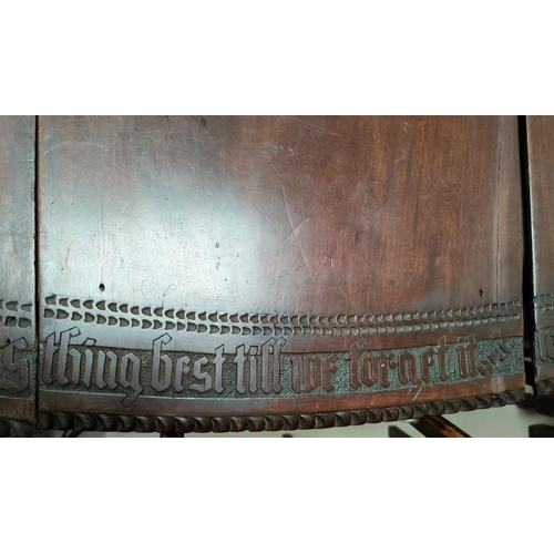 781 - An early to mid 1800's oval mahogany table top in 3 pieces with a very long hand carved saying to ou... 