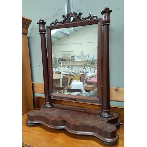 783 - A Victorian mahogany half size cheval mirror with turned tapering columns, with floral finial, heigh... 