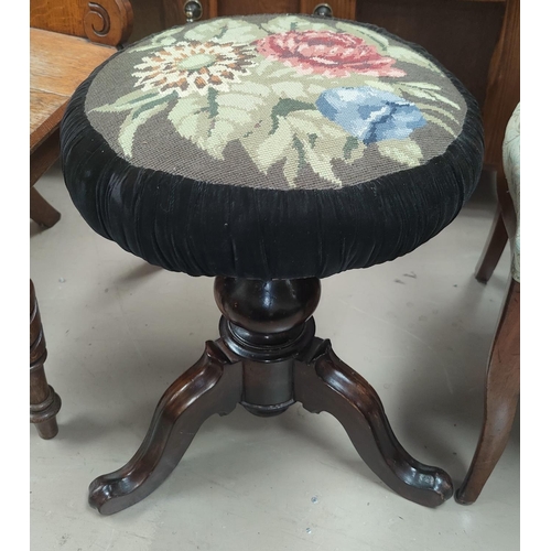 797 - A mahogany circular rise and fall piano stool and a circular foot stool