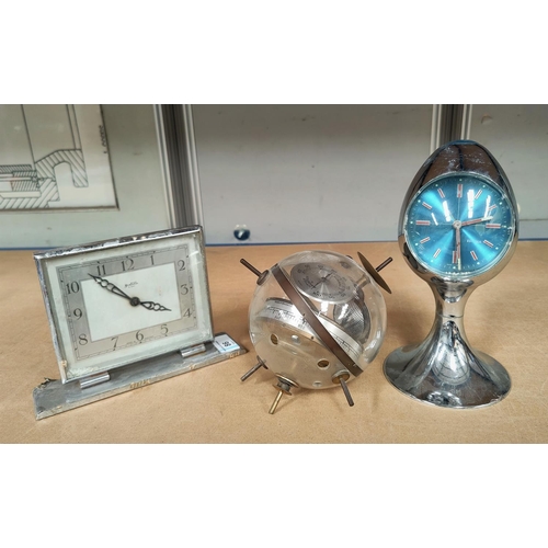 86 - A vintage 'Sputnik' West German barometer, an Estyma egg clock and a chrome mantel clock