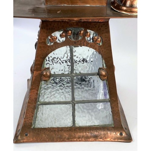 109 - An Arts & Crafts hall lantern in planished copper, square flared form with beaded glass panels (1 a.... 