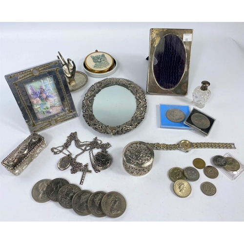 578 - A white metal oval mirror decorated with Chinese dragons; a hallmarked silver picture frame, other s... 