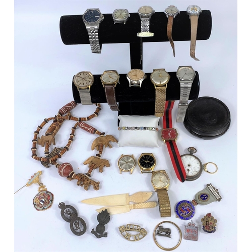 590 - A Seiko quartz wrist watch and a selection of other watches and costume jewellery.