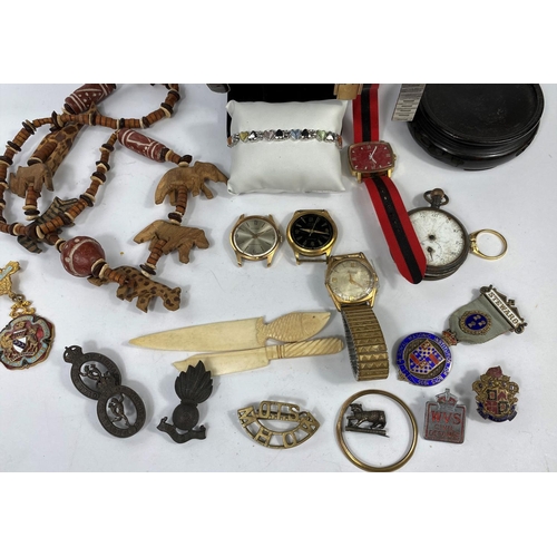 590 - A Seiko quartz wrist watch and a selection of other watches and costume jewellery.