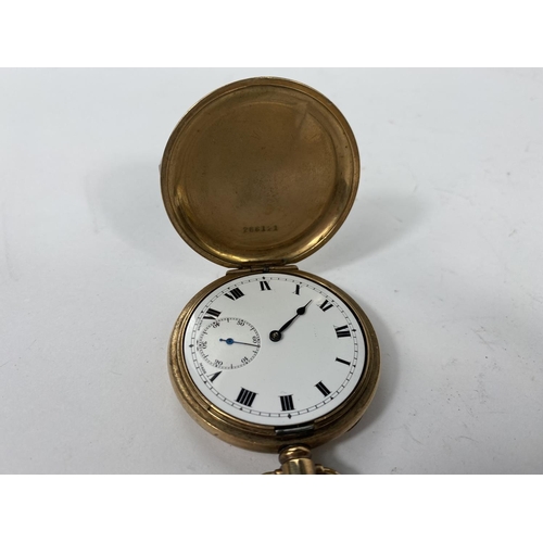 596 - A keyless gold plated Hunter pocket watch (not working) and 3 ladies wristwatches