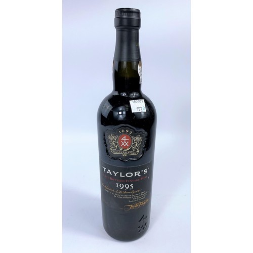 192D - A vintage bottle of 1980 Warre's 20% vol 75cl, a Bottle of Taylor's late vintage 1995 Port 75cl 20% ... 