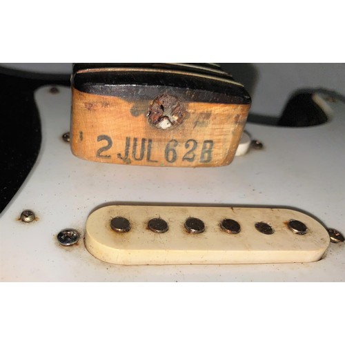 152 - A 1962 Fender Stratocaster guitar with black body in hard case (in need of restoration - see all ima... 