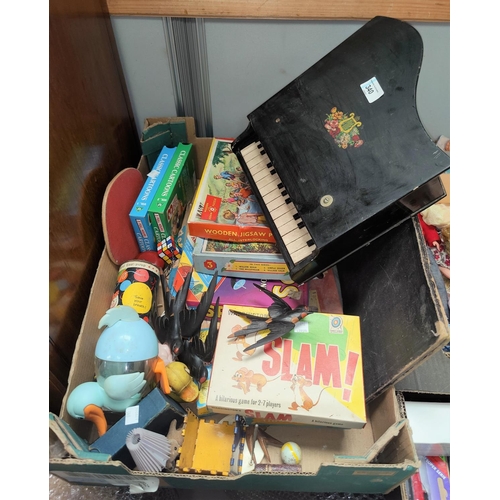 340 - A child's miniature grand piano and a selection of mid 20th century vintage children's games etc