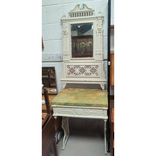 755A - A Victorian cast iron mirror tile back washstand/dressing table with marble effect top