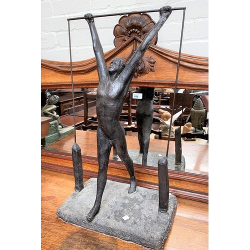 371 - D. Ainsworth: Local artist, a large studio pottery figure of a man holding a wire with weights, heig... 